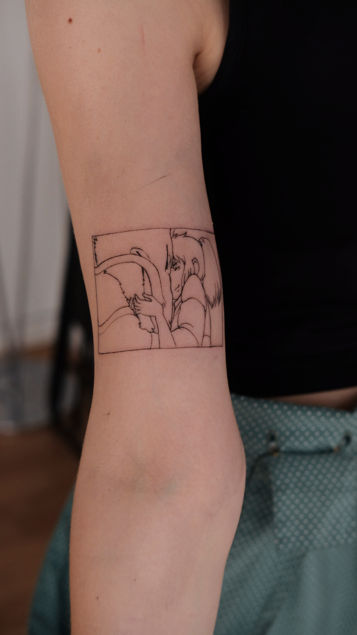Spirited away tattoo on arm