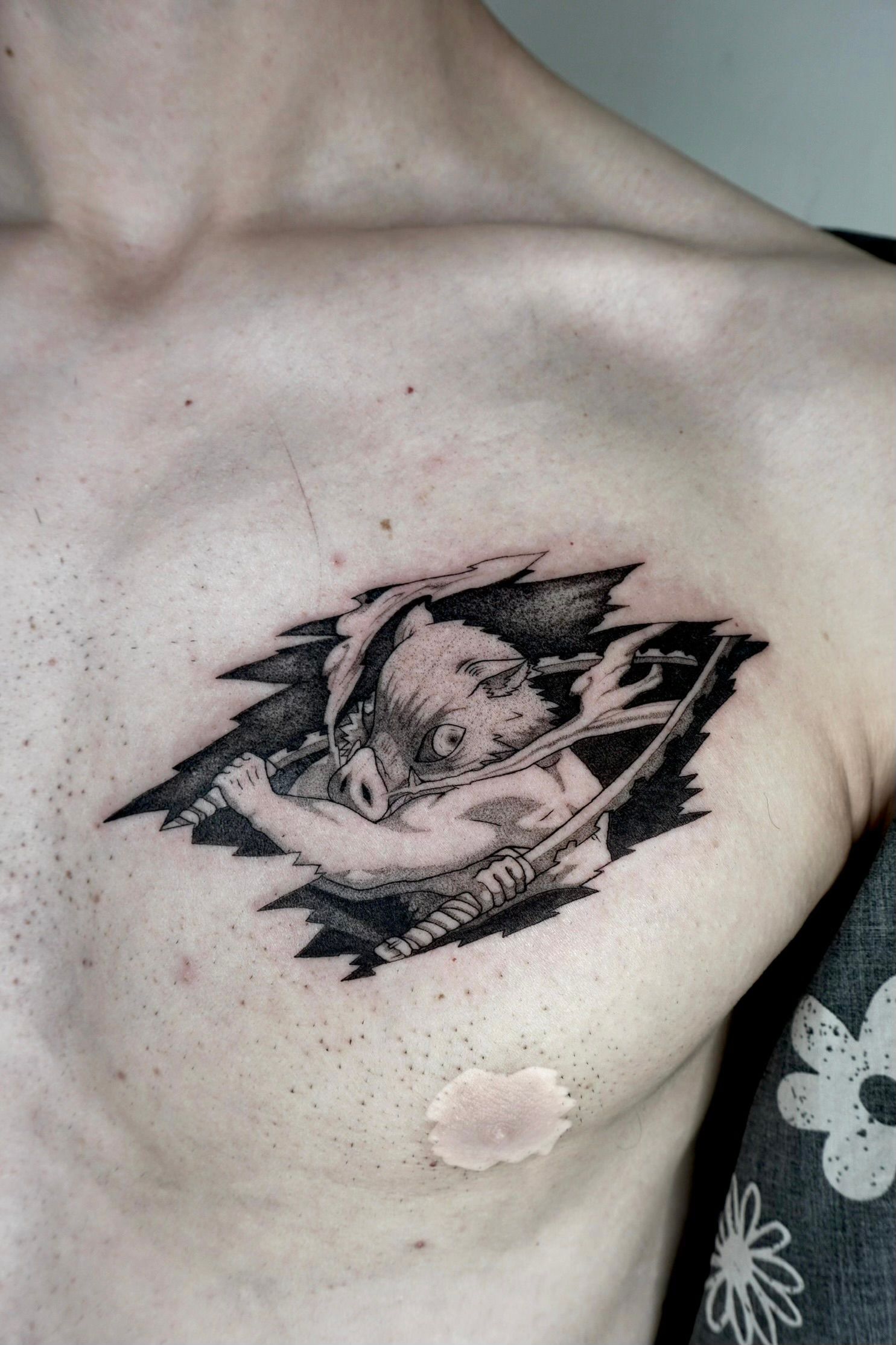 Inosuke Demon Slayer im Anime Style auf Brust von ink.ria in Leipzig