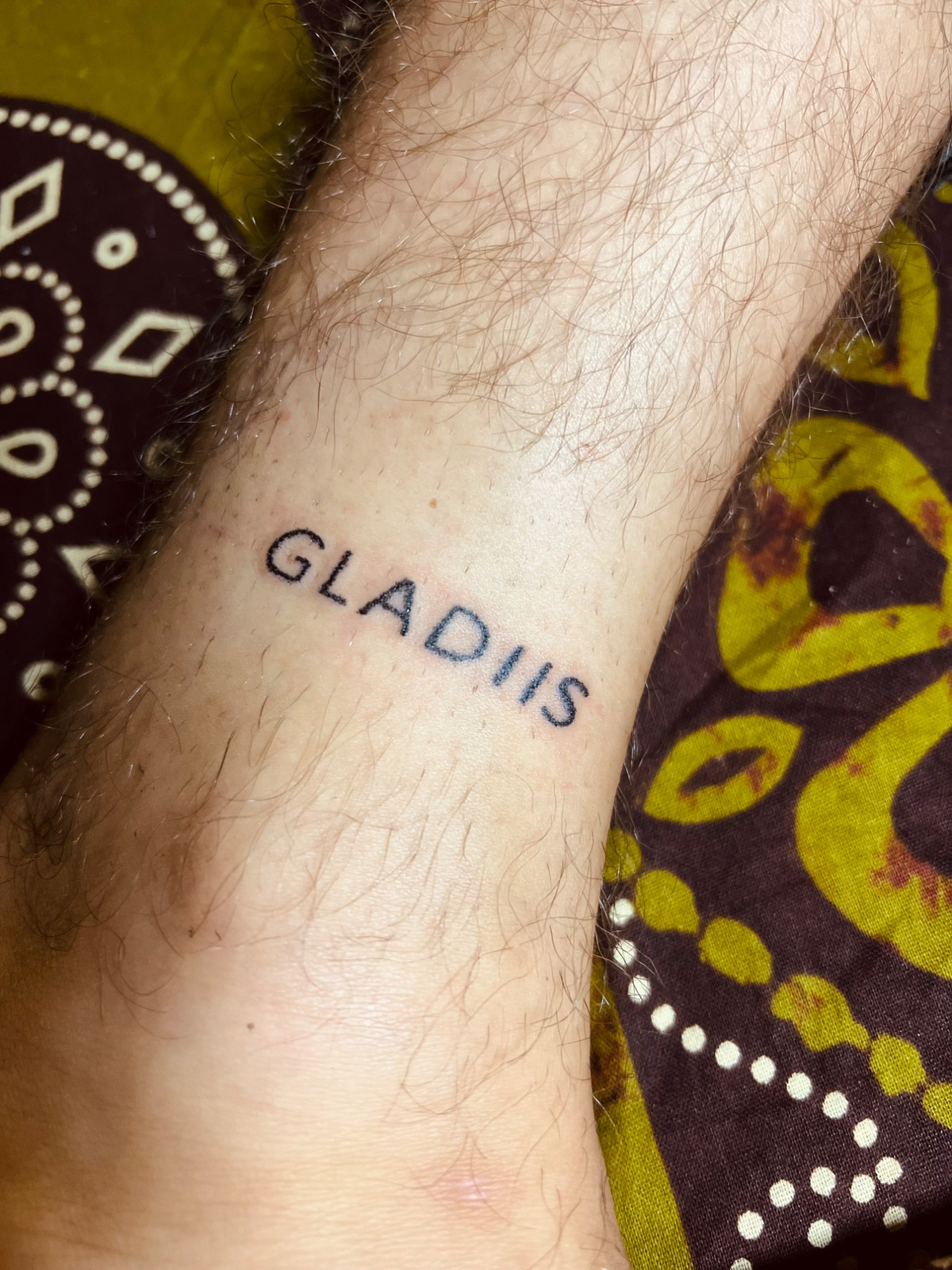 Name | handpoke lettering in Line Work style on Ankle by Haneliko Augsburg