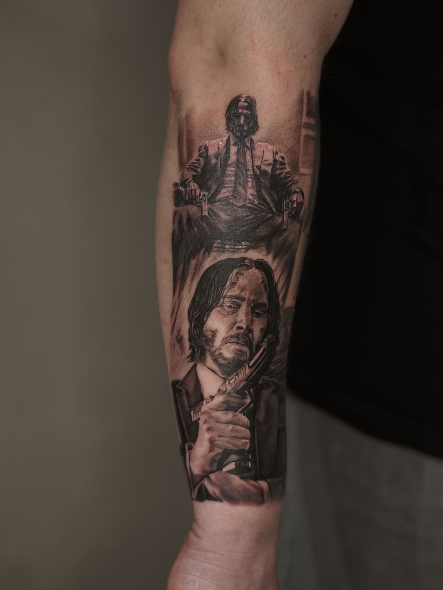 John Wick in Black & Gray style on Forearm by Julian Sell 39108