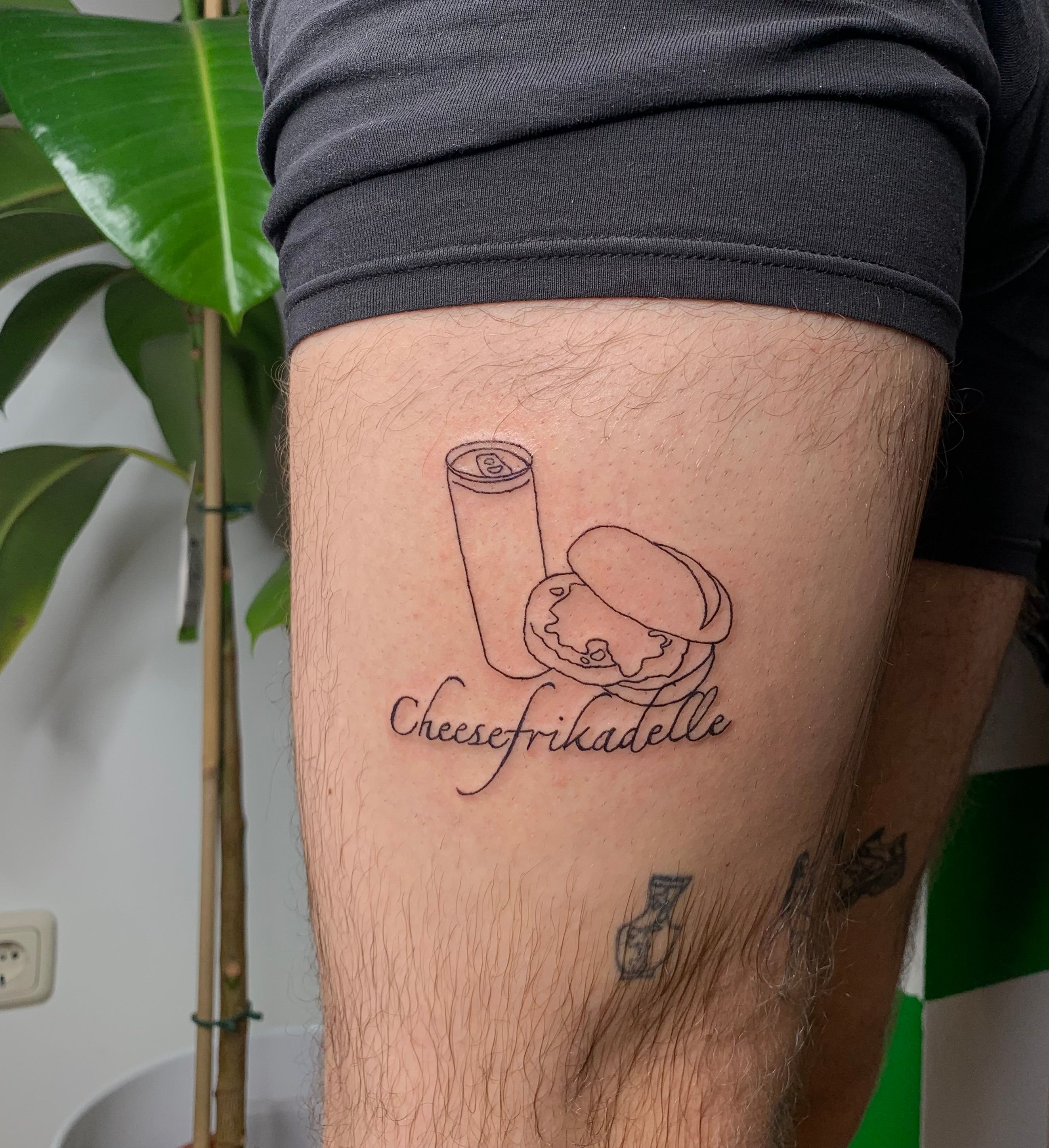 Custom Käsefrikadellenbrötchen in Ignorant style on Thigh by Guccischnalle Leipzig