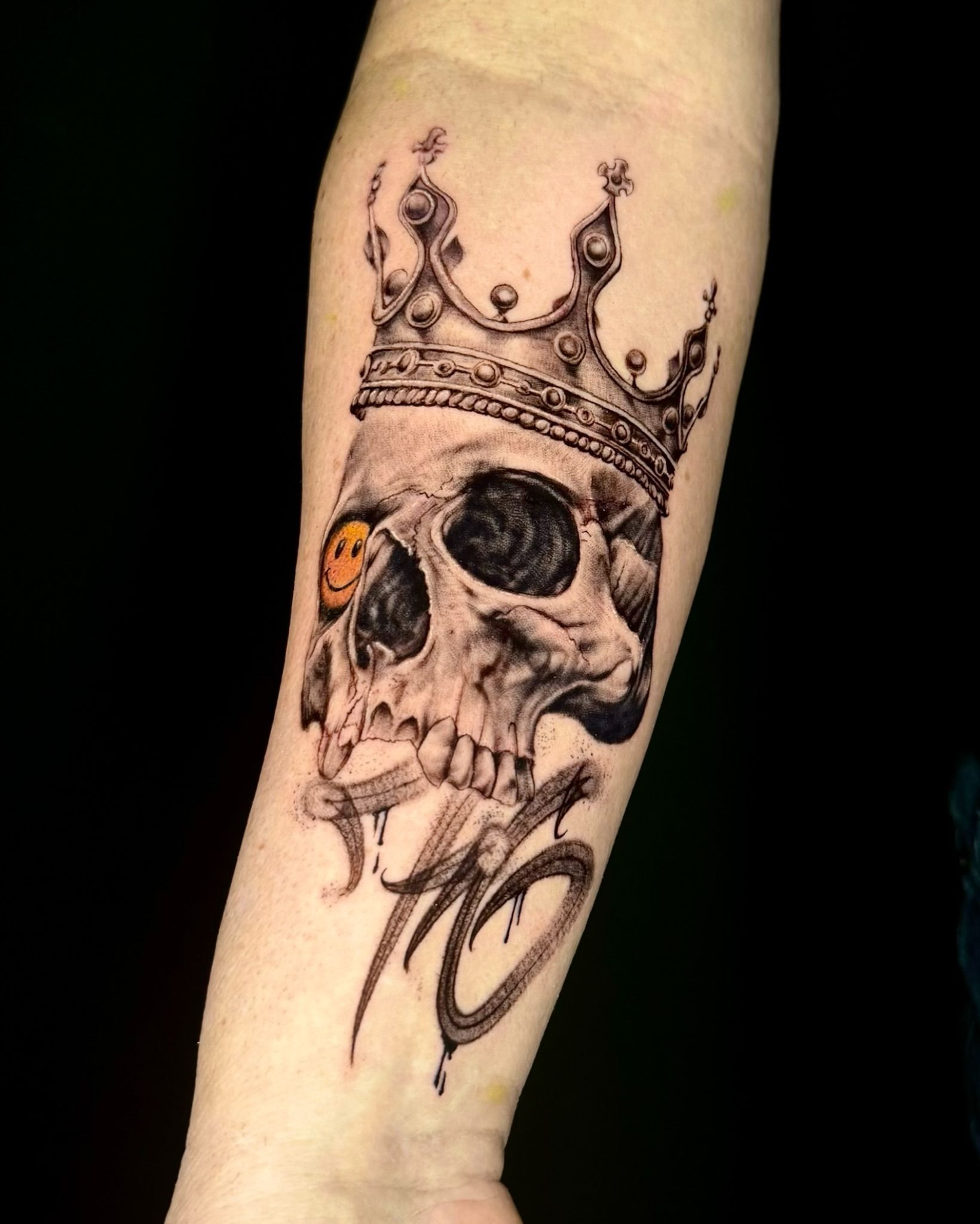 Totenkopf des Königs in Black & Gray style on Forearm by Won Ink Hamburg