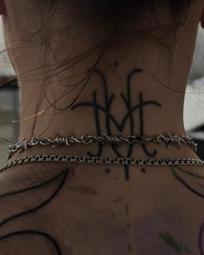 bold ornament in Ornamental style on Neck by studio gamine Freiburg im Breisgau