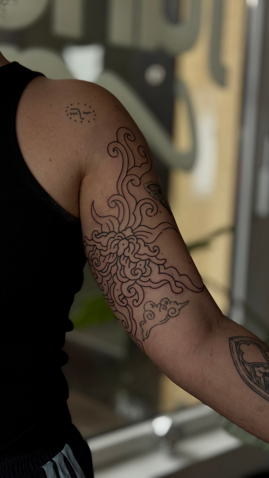 detailed ornamental floral filler in style on Upper Arm by debo.studio Freiburg im Breisgau