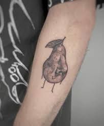 Conceptual Tattoos Birne Leg Tattoo by mansiehtsichmal.tattoo in Leipzig