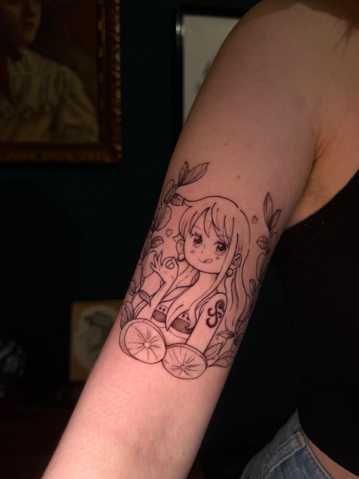 Nami in Anime style on Upper Arm by Lessguilt Recklinghausen