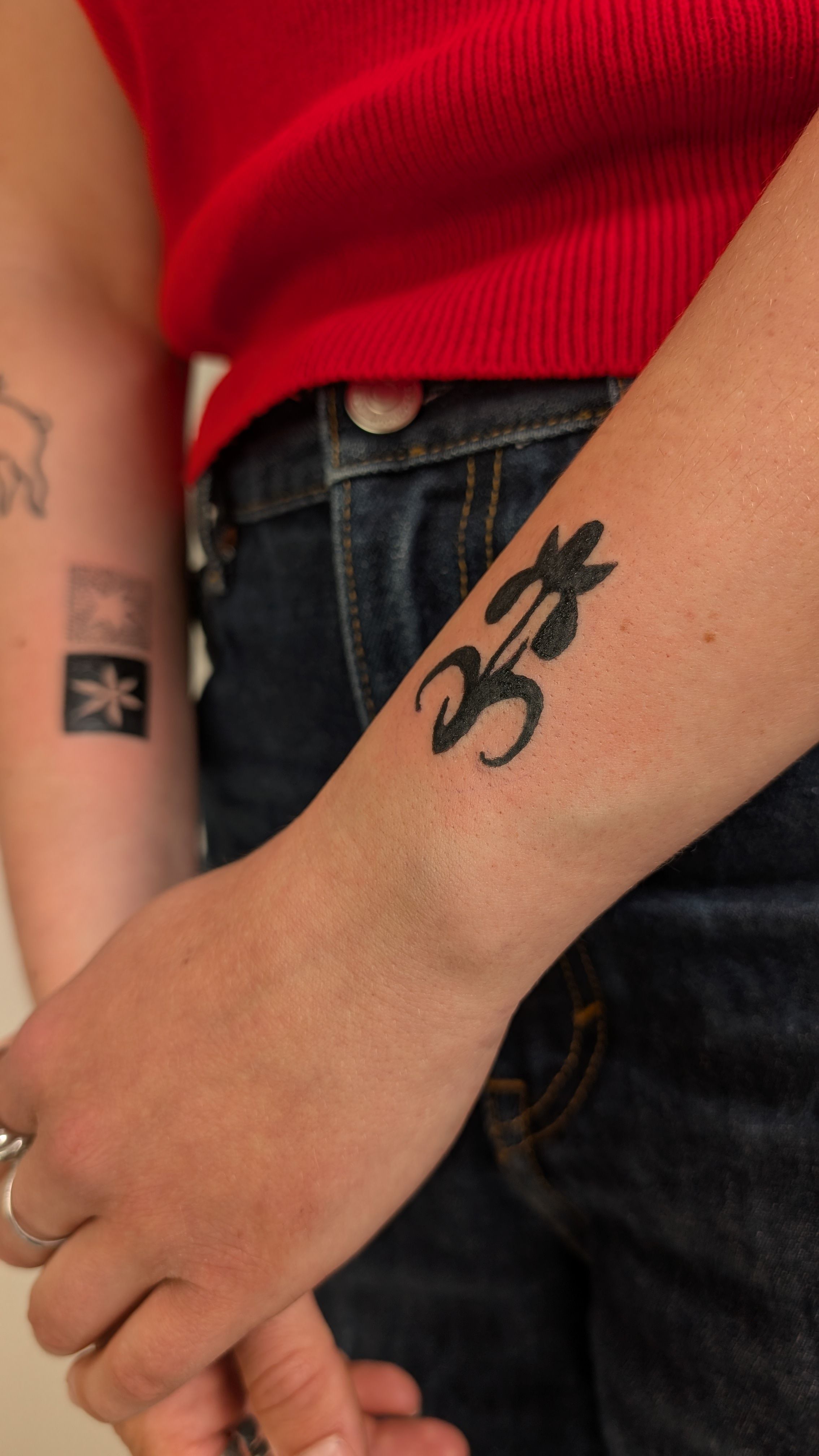 Iris mini in Blackwork style on Forearm by janus_tattoo Hamburg