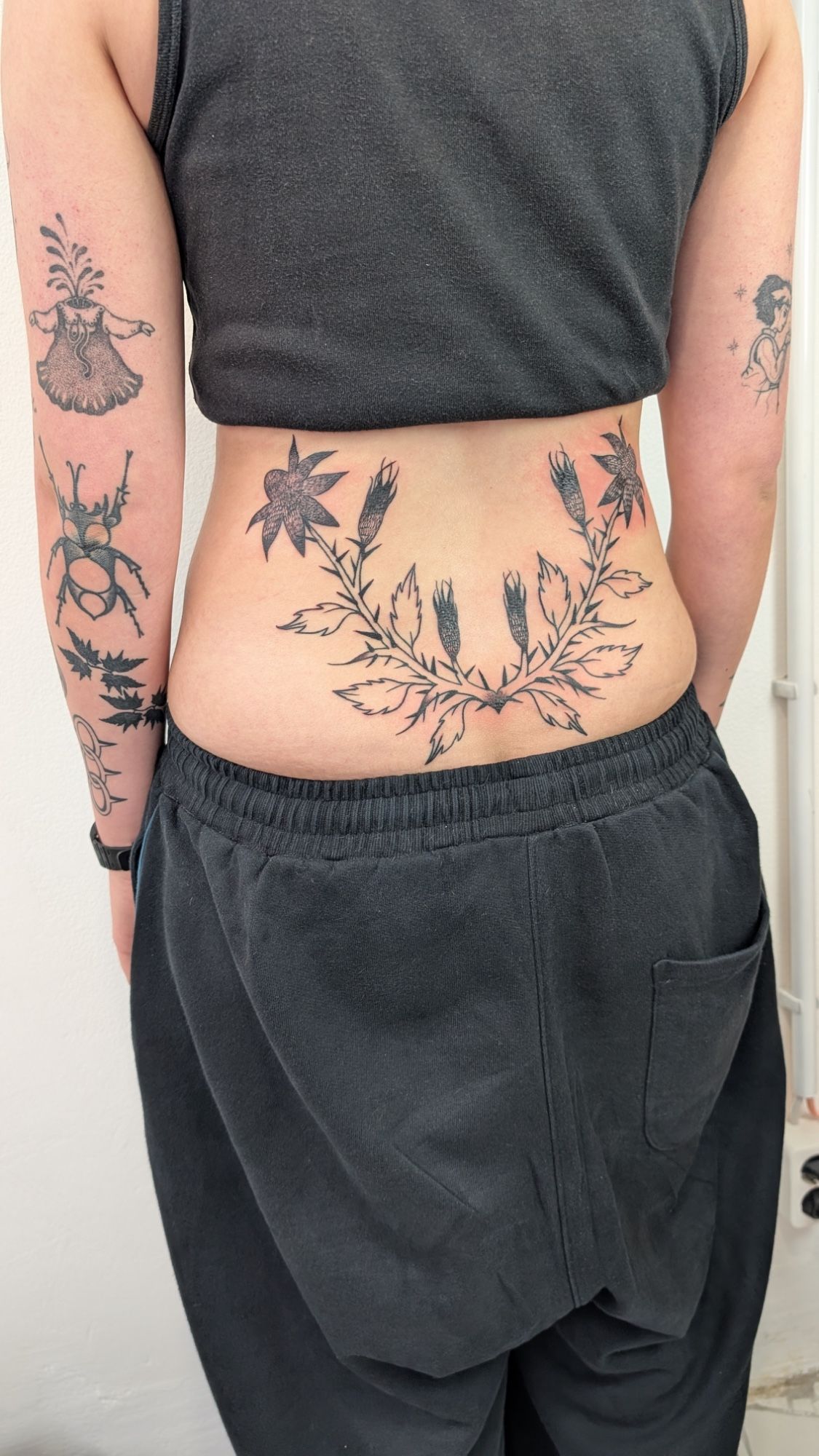 abstraktes distel Arschegweih / half back piece in Illustrative style on by janus_tattoo Hamburg