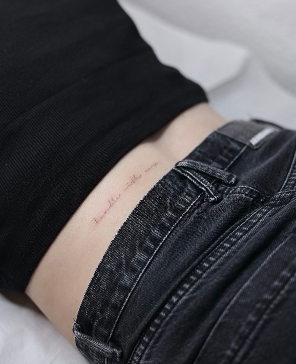 Handle With Care in Fineline style on Back by skinofglass_ Hamburg