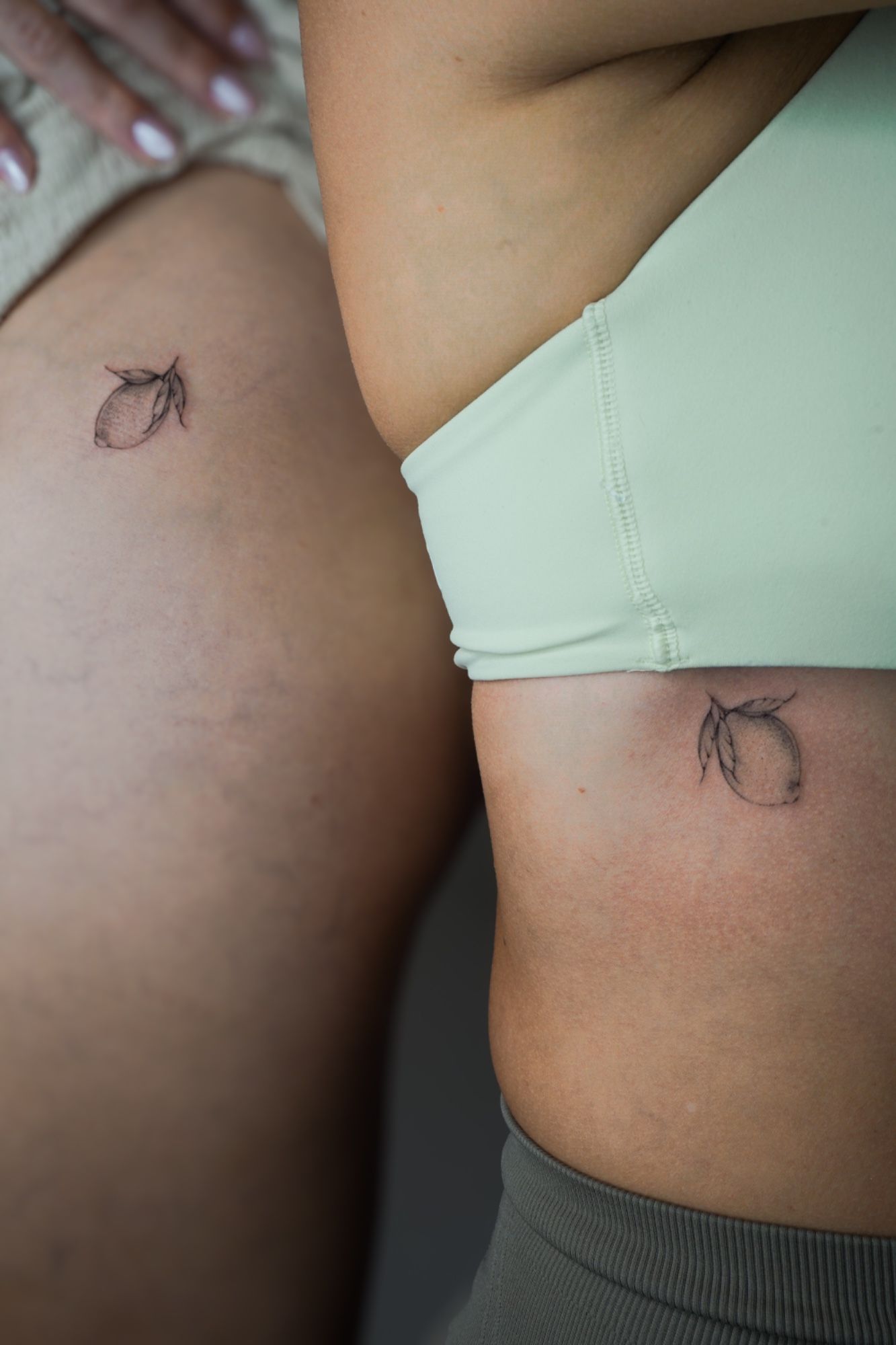 Zitronen in Fineline style on Ribs by Ziska Ink Tattoo Studio 27339