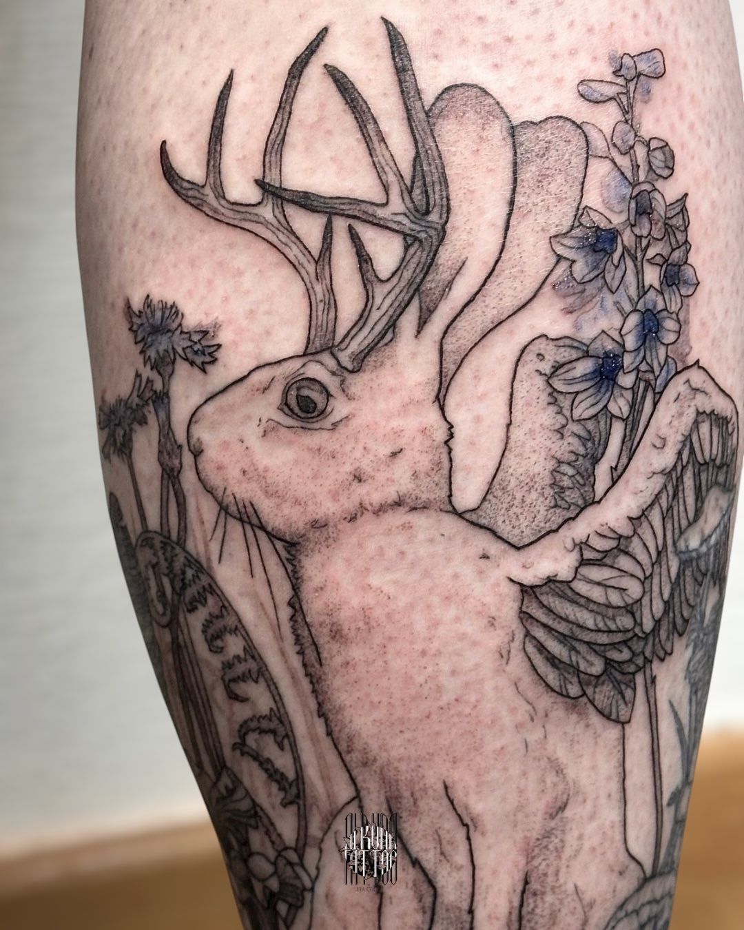 Wolpertinger Custom Tattoo in Black & Gray style on Calf by Alruna Leipzig