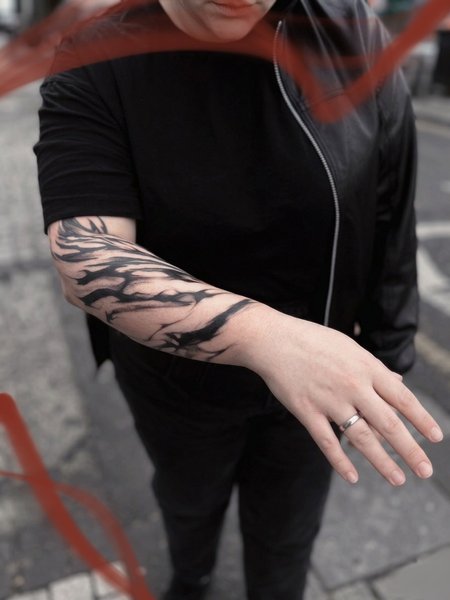 Black work/abstract sleeve in & Gray style on Forearm by Atelier tat Leipzig