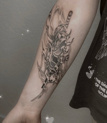 Oni mask in Black & Gray style on Forearm by Atelier tat Leipzig