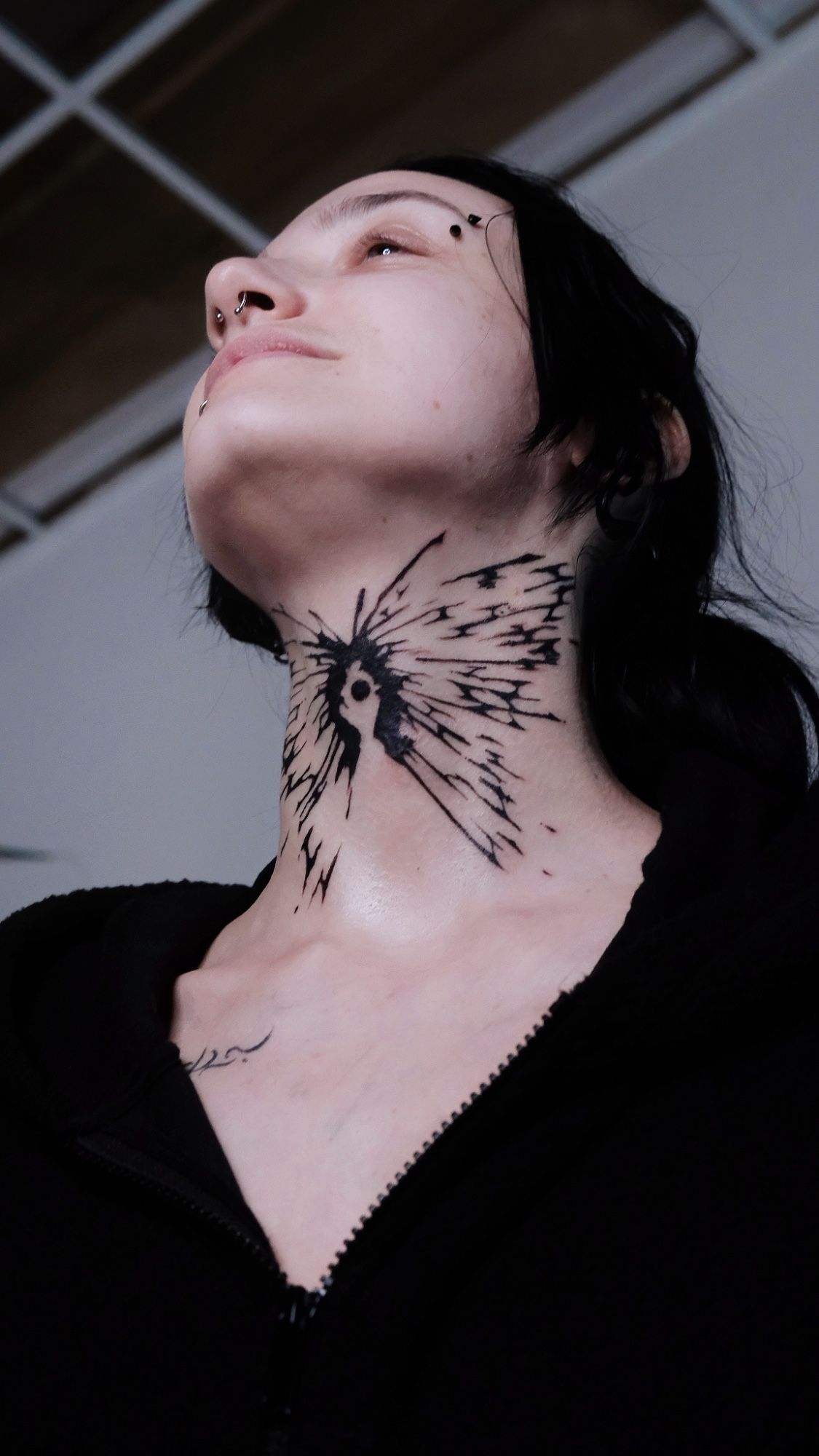 Arcane im Conceptual Tattoos Style auf Nacken von Atelier tat in Leipzig