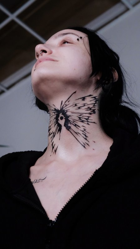 Arcane in Conceptual Tattoos style on Neck by Atelier tat Leipzig