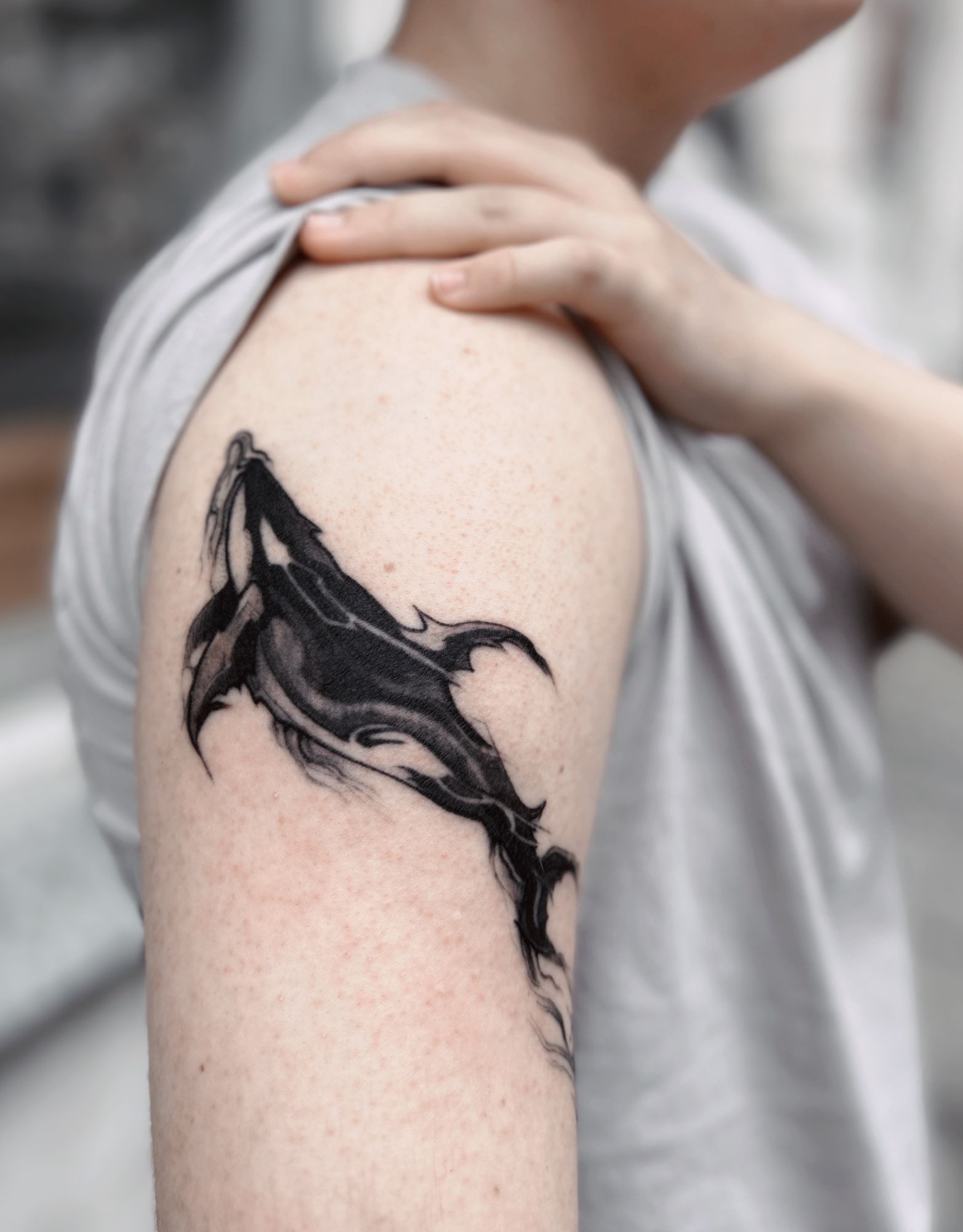 Orca tattoo in Illustrative style on Shoulder by Atelier tat Leipzig