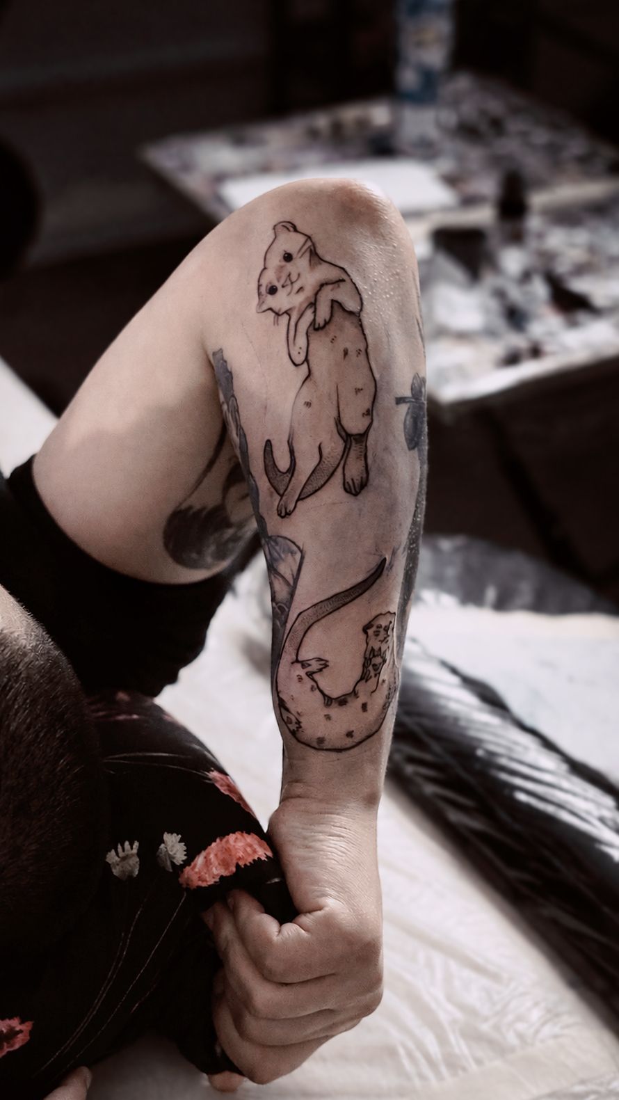 Otter tattoos in Illustrative style on Upper Arm by Atelier tat Leipzig