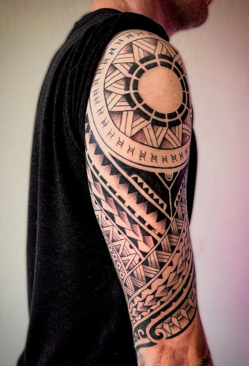 Maori tattoo in Polynesian style as an upper arm sleeve by Jennefer