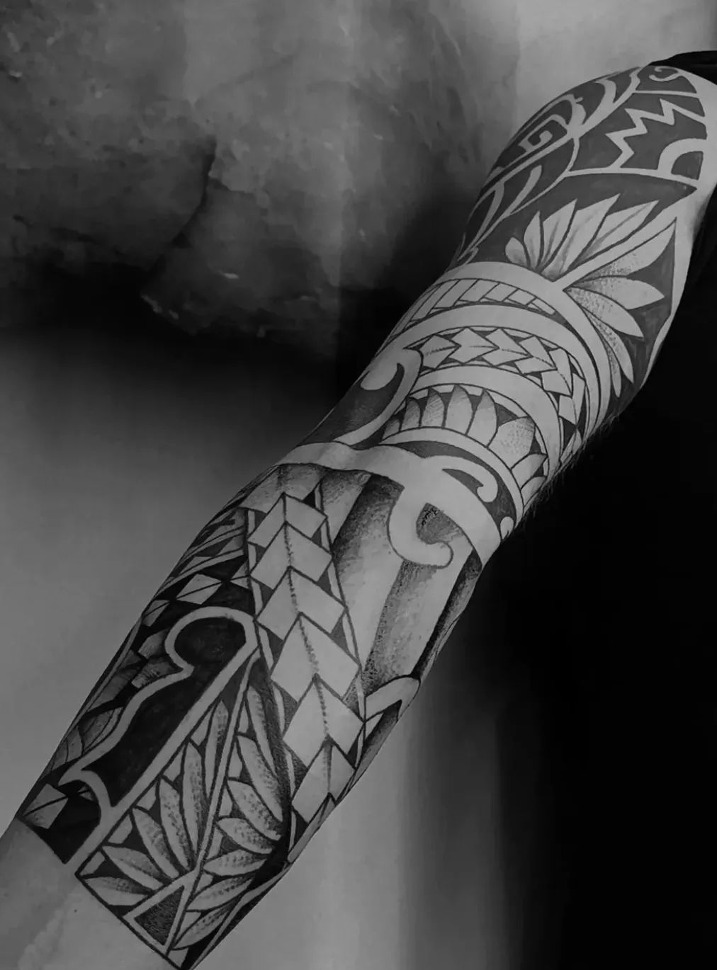 Maori tattoo in Polynesian style as a sleeve on the arm