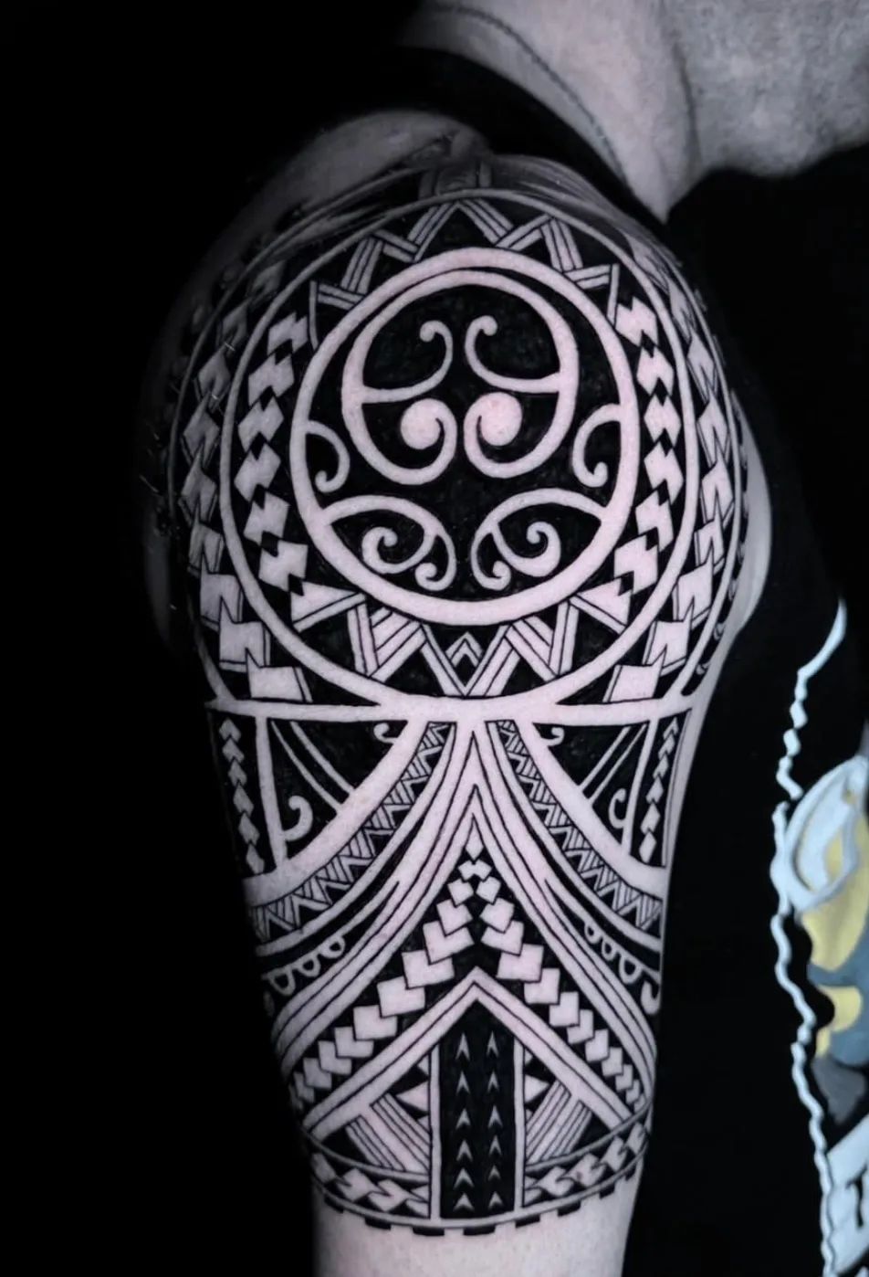 Maori tattoo in Polynesian style as an upper arm sleeve